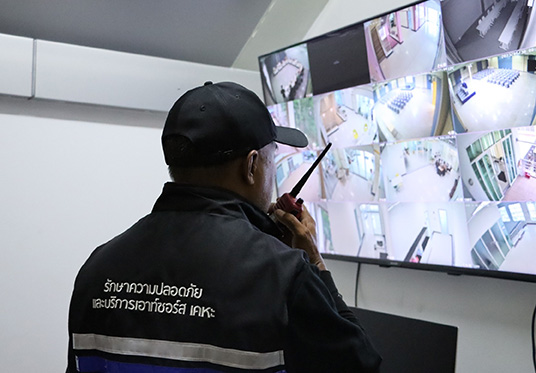 A security guard monitoring the cctv footage